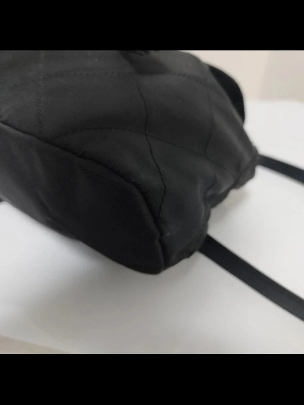 Prada Black Quilted Nylon Drawstring Backpack with Gold Hardware
